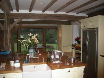 kitchen using reclaimed oak.jpg1